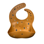 Découvrez nos bavoirs en silicone conçus en Allemagne, parfaits pour les repas des tout-petits. Faciles à nettoyer et à ranger, sans BPA, BPS et PVC, avec une boutonnière renforcée pour plus de sécurité. Idéaux pour un repas sans désordre.