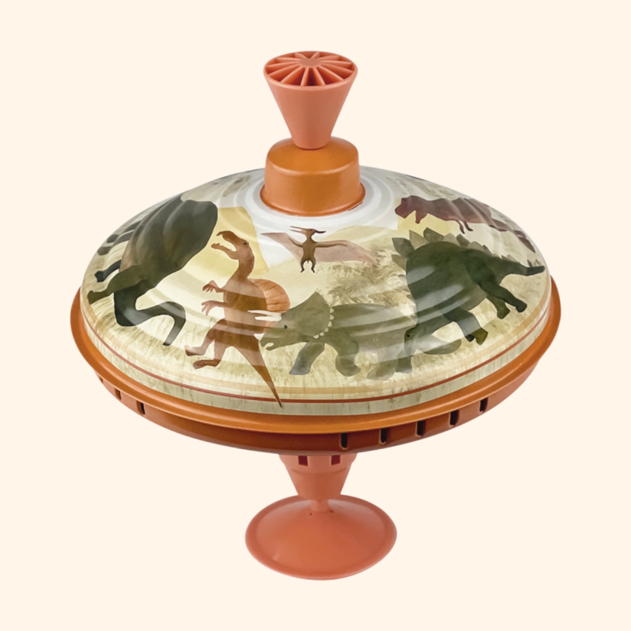 Toupie en métal Dino, un jouet classique pour tous les âges. Tirez, poussez et regardez-la tourner avec un joli bourdonnement. Des heures de plaisir garanties !